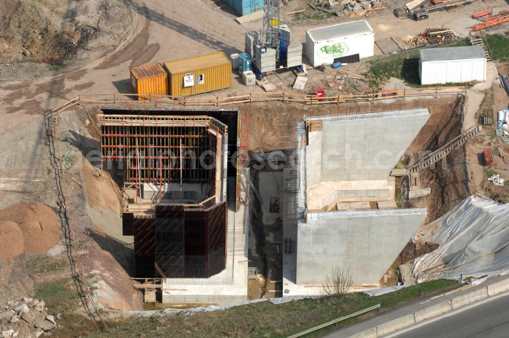 Eisenach from above - Blick auf die Baustelle der Ausfahrt / Anschlussstelle Eisenach-West der A4. Hier eine Überführung zur B7 im Südteil. Der Neubau ist Teil des Projekt Nordverlegung / Umfahrung Hörselberge der Autobahn E40 / A4 in Thüringen bei Eisenach. Durchgeführt werden die im Zuge dieses Projektes notwendigen Arbeiten unter an derem von den Mitarbeitern der Niederlassung Weimar der EUROVIA Verkehrsbau Union sowie der Niederlassungen Abbruch und Erdbau, Betonstraßenbau, Ingenieurbau und TECO Schallschutz der EUROVIA Beton sowie der DEGES.