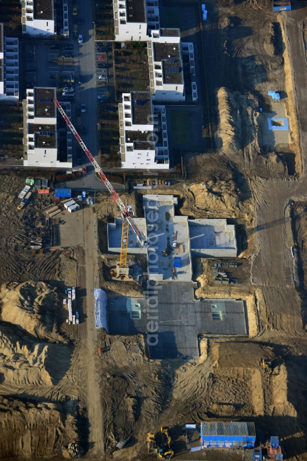 Berlin from above - Construction site of new houses in Truman-Allee in Berlin-Steglitz. The company responsible for the construction is NCC Germany GmbH