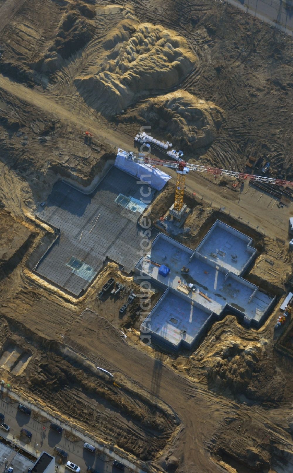 Berlin from the bird's eye view: Construction site of new houses in Truman-Allee in Berlin-Steglitz. The company responsible for the construction is NCC Germany GmbH