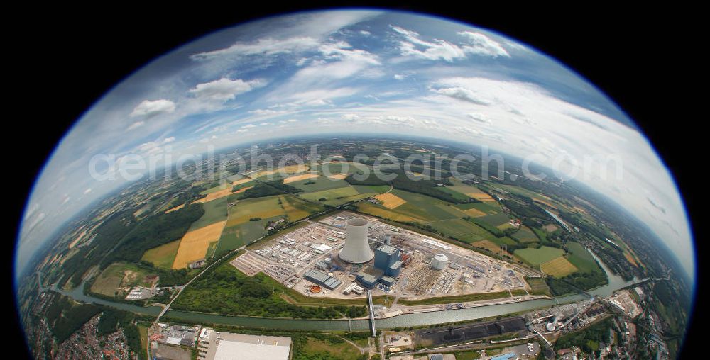 Aerial photograph Datteln - Fish Eye Blick auf die Baustelle des neuen Steinkohlekraftwerk Datteln / Castrop-Rauxel im Ruhrgebiet am Dortmund-Ems-Kanal. Der Kraftwerksneubau ist auch bekannt als EON Datteln 4. Datteln 4 geht 2012 als Monoblockanlage mit einer Bruttoleistung von 1.100 MW in Betrieb und ersetzt die Blöcke 1 bis 3 in Datteln und Shamrock in Herne, die ihr technisch-wirtschaftliches Laufzeitende erreichen werden. Snowy winter construction site of new coal-fired power plant dates on the Dortmund-Ems Canal.