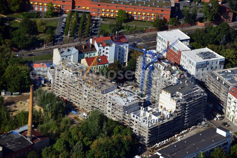 Berlin Friedrichshain from the bird's eye view: Construction site of a new apartment building at Matthiasstrasse near Landsberger Allee in the district Friedrichshain in Berlin