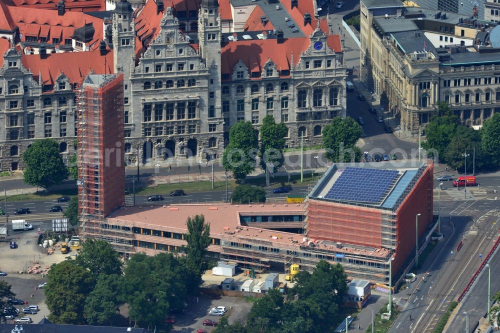 Leipzig from the bird's eye view: Construction site of the new church in the city center of Leipzig in the state of Saxony. View of the new town hall opposite which the new catholic church is being developed as part of a redevelopment of the area Roßplatz and Wilhelm Leuschner Platz at the inner city ring