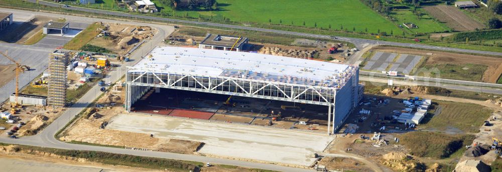 Aerial image Berlin Schönefeld - Baustelle des neuen Terminals am Flughafen Schönefeld (BBI). Der neue Terminal wird südlich des jetzigen Flughafens Berlin- Schönefeld errichtet. Ausführende Firmen: Hochtief AG; EUROVIA Beton; PORR; BERGER Bau; Karl Weiss; Matthai; Schäler Bau Berlin GmbH; STRABAG; Construction area of the new terminal at Schönefeld Airport (BBI). The new terminal is in the south of the airport Berlin -Schoenefeld quality built. Exporting companies: Hochtief AG; EUROVIA Beton; PORR; BERGER Bau; Karl Weiss; Matthai; Schäler Bau Berlin GmbH; STRABAG;