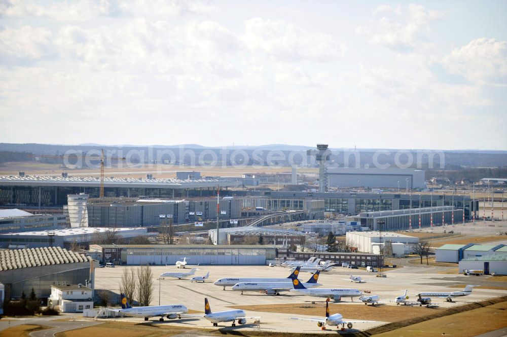 Aerial image Schönefeld - Construction area of the new terminal at Schönefeld Airport (BBI). The new terminal is in the south of the airport Berlin -Schoenefeld quality built. Exporting companies: Hochtief AG; EUROVIA Beton; PORR; BERGER Bau; Karl Weiss; Matthai; Schäler Bau Berlin GmbH; STRABAG;