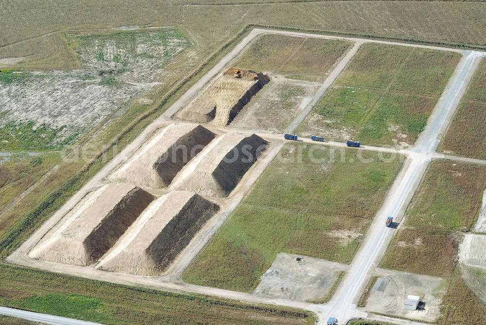 Aerial image Schönefeld - Baustelle des neuen Terminals am Flughafen Schönefeld (BBI). Der neue Terminal wird südlich des jetzigen Flughafens Berlin- Schönefeld errichtet. Ausführende Firmen: Hochtief AG; EUROVIA Beton; PORR; BERGER Bau; Karl Weiss; Matthai; Schäler Bau Berlin GmbH; STRABAG; MAX BÖGL. Construction area of the new terminal at Schönefeld Airport (BBI). The new terminal is in the south of the airport Berlin-Schoenefeld quality built. Exporting companies: Hochtief AG; EUROVIA Beton; PORR; BERGER Bau; Karl Weiss; Matthai; Schäler Bau Berlin GmbH; STRABAG; MAX BÖGL.