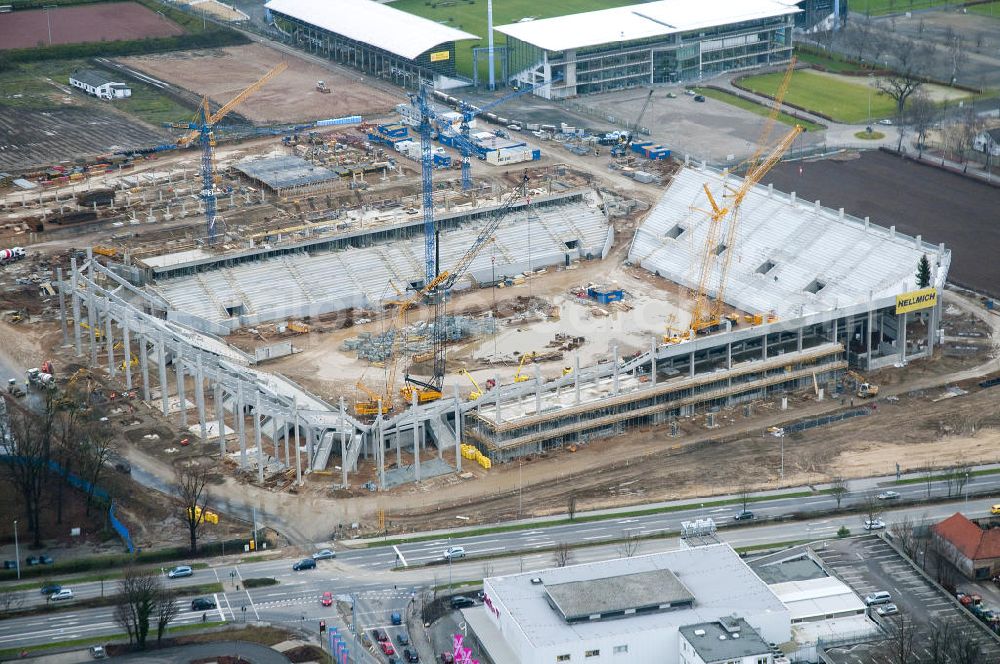 Aachen from the bird's eye view: Baustelle des Stadion des Fußballklubs Alemannia Aachen, dem Neuen Tivoli. Die Baustelle der WALTER HELLMICH GmbH bietet Platz für bis zu 33.000 Zuschauern und liegt im Sportpark Soers. Construction site of the stadium of the football club Alemannia Aachen, the new Tivoli.