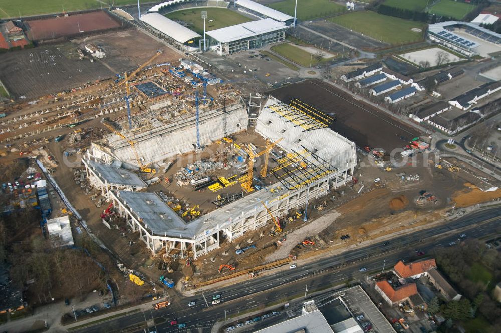 Aachen from above - Baustelle des Stadion des Fußballklubs Alemannia Aachen, dem Neuen Tivoli. Die Baustelle der WALTER HELLMICH GmbH bietet Platz für bis zu 33.000 Zuschauern und liegt im Sportpark Soers. Construction site of the stadium of the football club Alemannia Aachen, the new Tivoli.