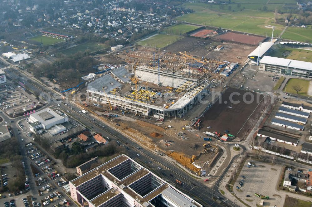 Aachen from the bird's eye view: Baustelle des Stadion des Fußballklubs Alemannia Aachen, dem Neuen Tivoli. Die Baustelle der WALTER HELLMICH GmbH bietet Platz für bis zu 33.000 Zuschauern und liegt im Sportpark Soers. Construction site of the stadium of the football club Alemannia Aachen, the new Tivoli.