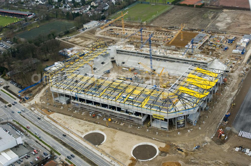 Aerial image Aachen - Baustelle des Stadion des Fußballklubs Alemannia Aachen, dem Neuen Tivoli. Die Baustelle der WALTER HELLMICH GmbH bietet Platz für bis zu 33.000 Zuschauern und liegt im Sportpark Soers. Construction site of the stadium of the football club Alemannia Aachen, the new Tivoli.