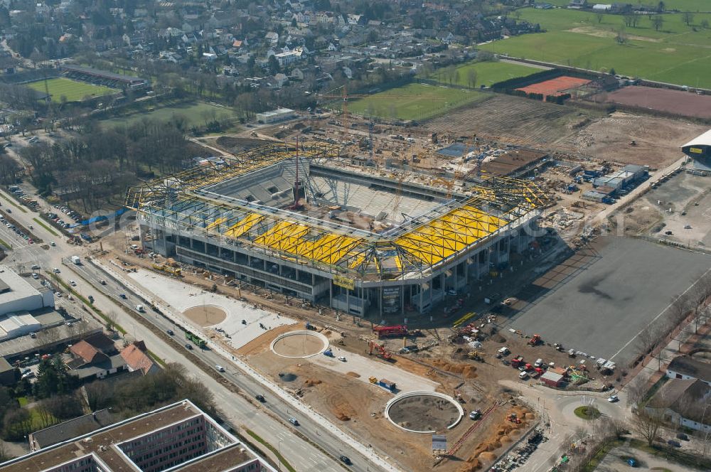 Aerial photograph Aachen - Baustelle des Stadion des Fußballklubs Alemannia Aachen, dem Neuen Tivoli. Die Baustelle der WALTER HELLMICH GmbH bietet Platz für bis zu 33.000 Zuschauern und liegt im Sportpark Soers. Construction site of the stadium of the football club Alemannia Aachen, the new Tivoli.