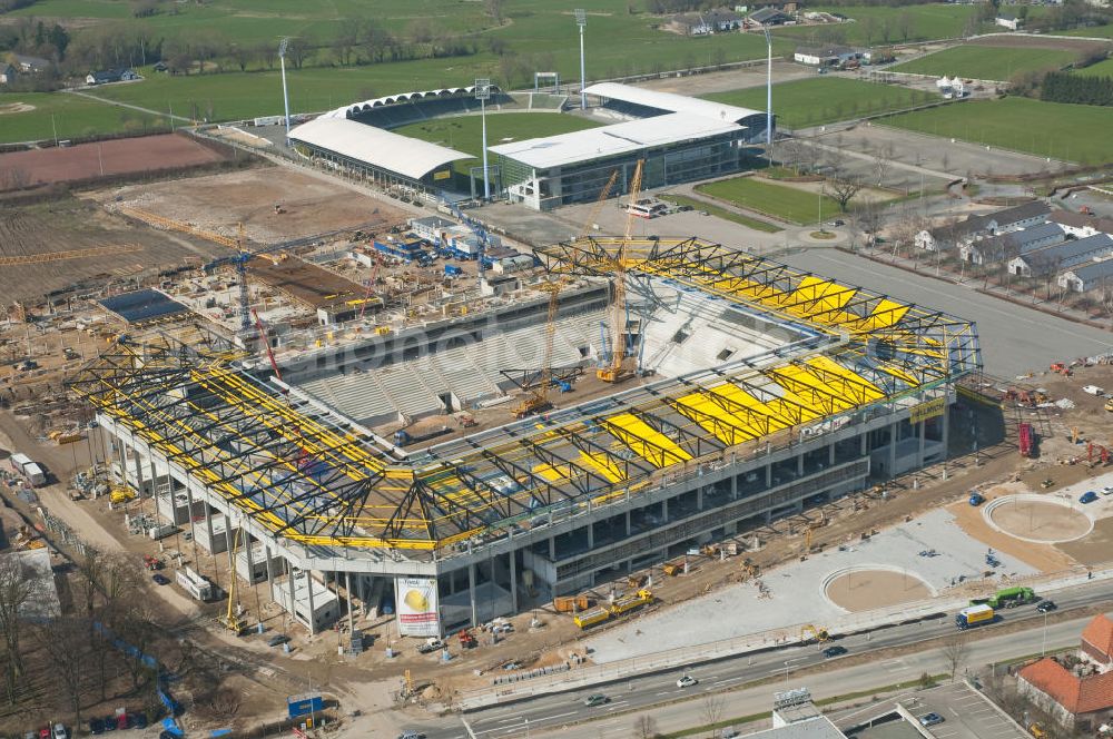 Aachen from above - Baustelle des Stadion des Fußballklubs Alemannia Aachen, dem Neuen Tivoli. Die Baustelle der WALTER HELLMICH GmbH bietet Platz für bis zu 33.000 Zuschauern und liegt im Sportpark Soers. Construction site of the stadium of the football club Alemannia Aachen, the new Tivoli.