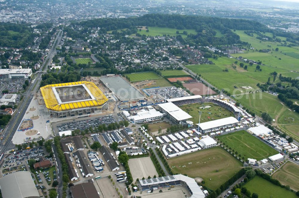 Aachen from above - Baustelle des Stadion des Fußballklubs Alemannia Aachen, dem Neuen Tivoli. Die Baustelle der WALTER HELLMICH GmbH bietet Platz für bis zu 33.000 Zuschauern und liegt im Sportpark Soers. Construction site of the stadium of the football club Alemannia Aachen, the new Tivoli.