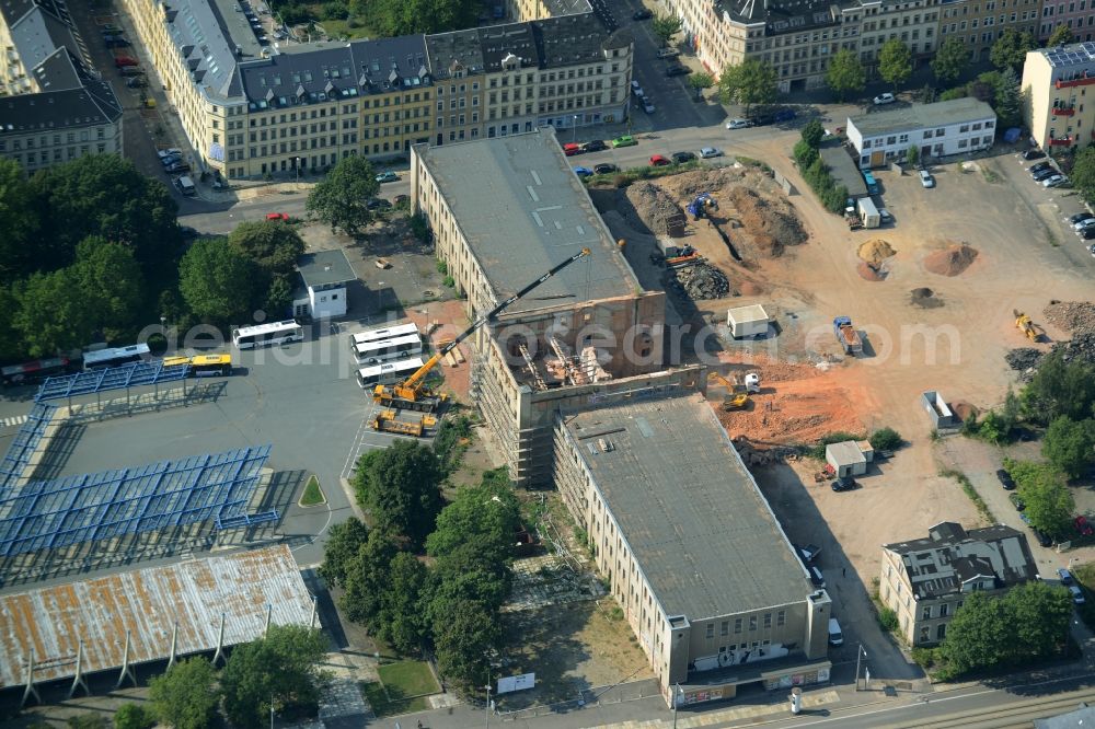 Chemnitz from the bird's eye view: Construction site at the bus station in Chemnitz in the state of Saxony. Construction works are taking place at an old building and site next to the main bus stop