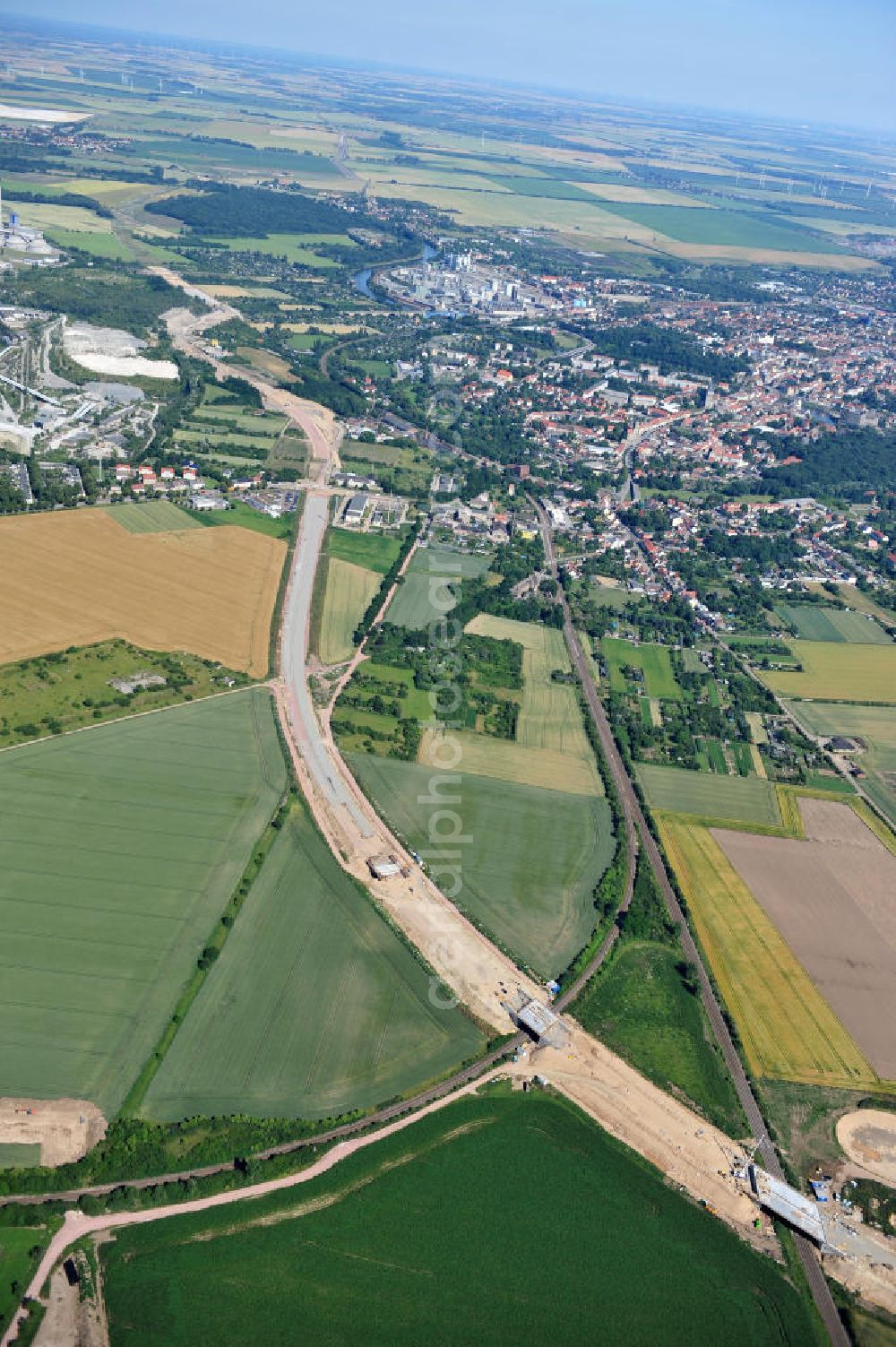 Aerial photograph Bernburg - Baustelle vom Neubau der Ortsumgehung Bernburg Bundesstraße B 6n mit Anschlußstelle an die Autobahn / Bundesautobahn A 14 in Sachsen-Anhalt. Ein Projekt von EUROVIA. Construction site of the new circuitous road B6n Bernburg with the new junction on to the freeway in the near of Bernburg in Saxony-Anhalt.