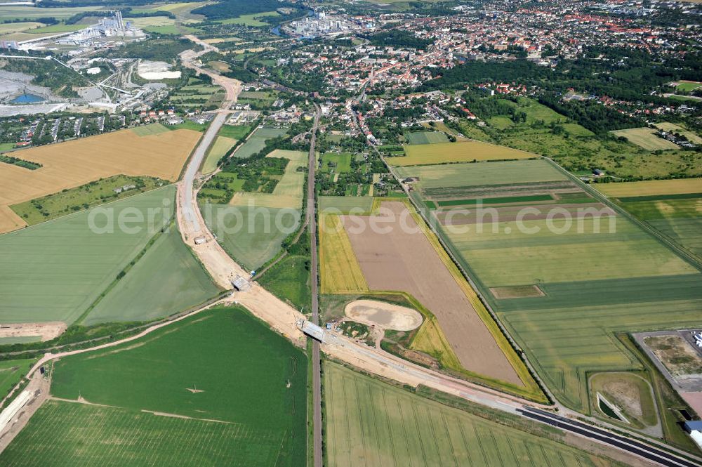 Aerial image Bernburg - Baustelle vom Neubau der Ortsumgehung Bernburg Bundesstraße B 6n mit Anschlußstelle an die Autobahn / Bundesautobahn A 14 in Sachsen-Anhalt. Ein Projekt von EUROVIA. Construction site of the new circuitous road B6n Bernburg with the new junction on to the freeway in the near of Bernburg in Saxony-Anhalt.