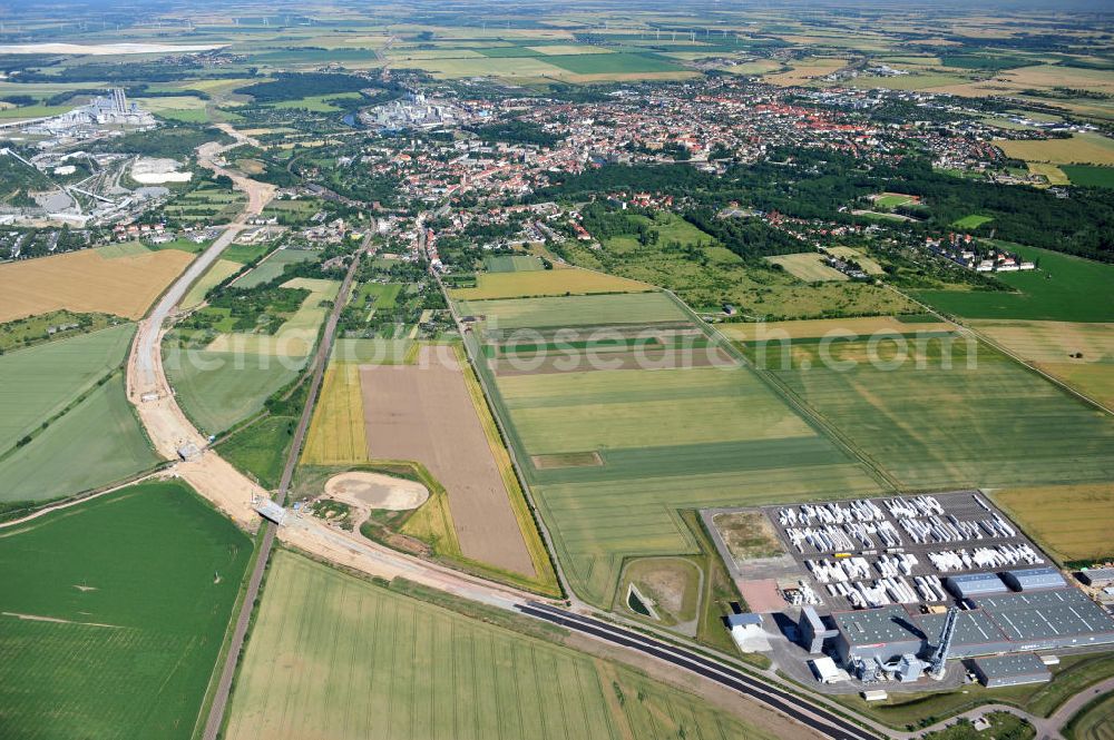 Aerial photograph Bernburg - Baustelle vom Neubau der Ortsumgehung Bernburg Bundesstraße B 6n mit Anschlußstelle an die Autobahn / Bundesautobahn A 14 in Sachsen-Anhalt. Ein Projekt von EUROVIA. Construction site of the new circuitous road B6n Bernburg with the new junction on to the freeway in the near of Bernburg in Saxony-Anhalt.