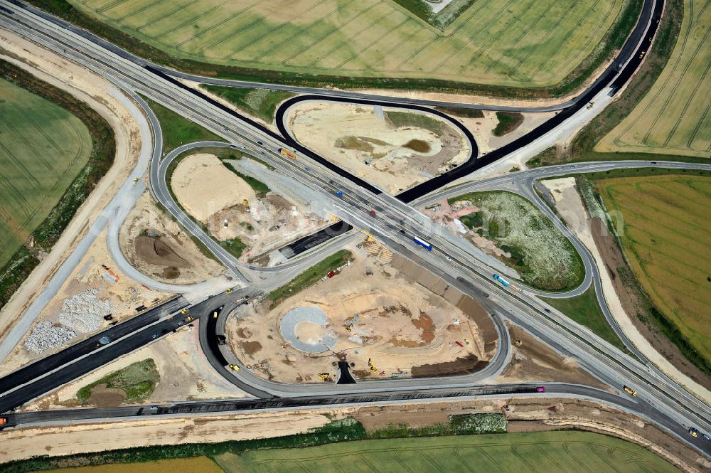 Aerial photograph Bernburg - Baustelle vom Neubau der Ortsumgehung Bernburg Bundesstraße B 6n mit Anschlußstelle an die Autobahn / Bundesautobahn A 14 in Sachsen-Anhalt. Ein Projekt von EUROVIA. Construction site of the new circuitous road B6n Bernburg with the new junction on to the freeway in the near of Bernburg in Saxony-Anhalt.