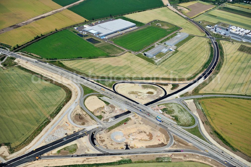 Bernburg from above - Baustelle vom Neubau der Ortsumgehung Bernburg Bundesstraße B 6n mit Anschlußstelle an die Autobahn / Bundesautobahn A 14 in Sachsen-Anhalt. Ein Projekt von EUROVIA. Construction site of the new circuitous road B6n Bernburg with the new junction on to the freeway in the near of Bernburg in Saxony-Anhalt.