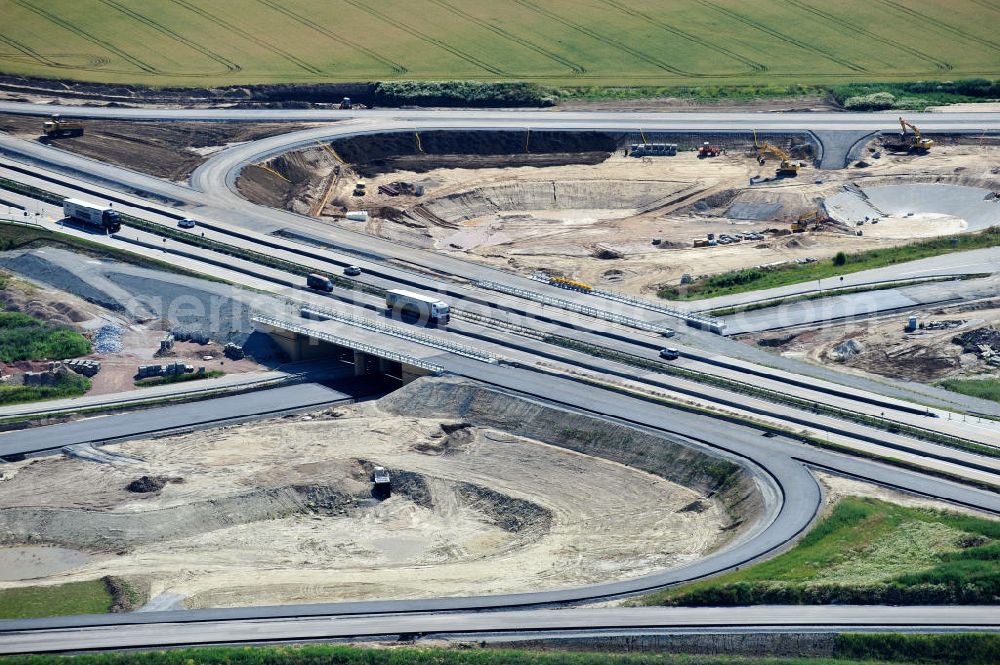 Bernburg from above - Baustelle vom Neubau der Ortsumgehung Bernburg Bundesstraße B 6n mit Anschlußstelle an die Autobahn / Bundesautobahn A 14 in Sachsen-Anhalt. Ein Projekt von EUROVIA. Construction site of the new circuitous road B6n Bernburg with the new junction on to the freeway in the near of Bernburg in Saxony-Anhalt.