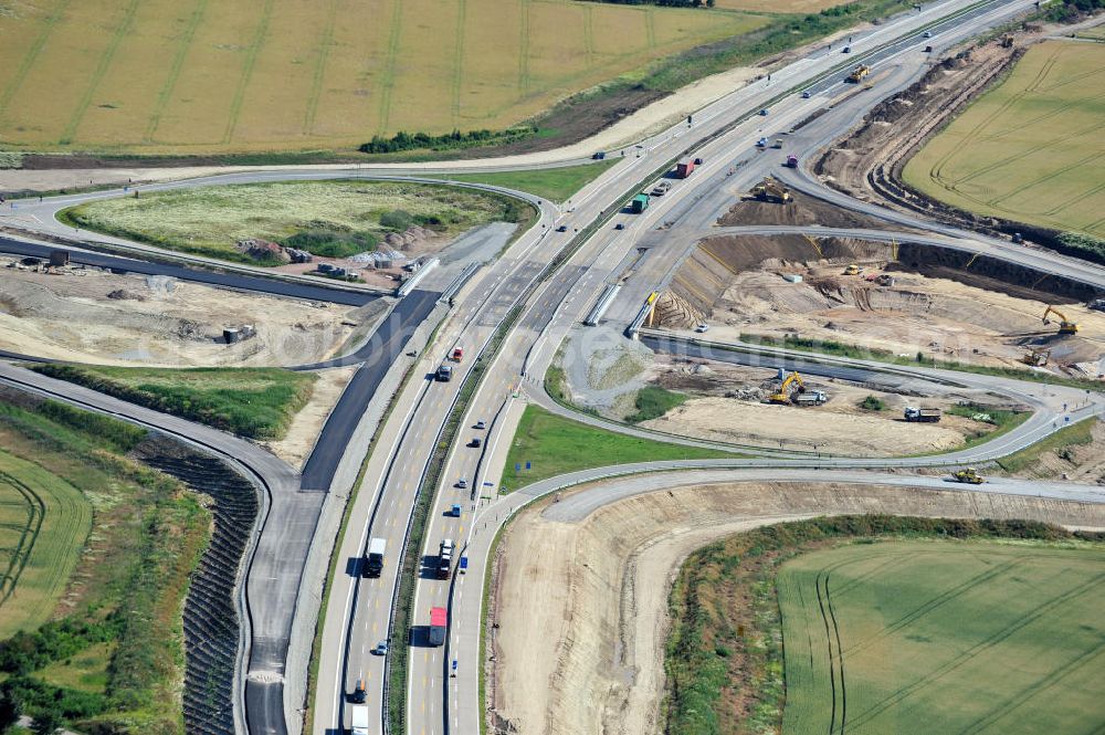 Bernburg from above - Baustelle vom Neubau der Ortsumgehung Bernburg Bundesstraße B 6n mit Anschlußstelle an die Autobahn / Bundesautobahn A 14 in Sachsen-Anhalt. Ein Projekt von EUROVIA. Construction site of the new circuitous road B6n Bernburg with the new junction on to the freeway in the near of Bernburg in Saxony-Anhalt.