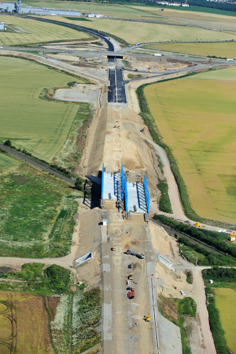 Aerial photograph Bernburg - Baustelle vom Neubau der Ortsumgehung Bernburg Bundesstraße B 6n mit Anschlußstelle an die Autobahn / Bundesautobahn A 14 in Sachsen-Anhalt. Ein Projekt von EUROVIA. Construction site of the new circuitous road B6n Bernburg with the new junction on to the freeway in the near of Bernburg in Saxony-Anhalt.