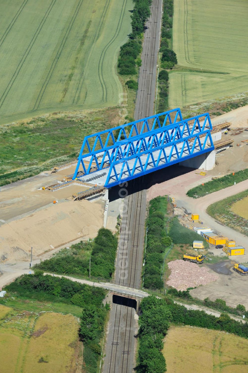 Bernburg from above - Baustelle vom Neubau der Ortsumgehung Bernburg Bundesstraße B 6n mit Anschlußstelle an die Autobahn / Bundesautobahn A 14 in Sachsen-Anhalt. Ein Projekt von EUROVIA. Construction site of the new circuitous road B6n Bernburg with the new junction on to the freeway in the near of Bernburg in Saxony-Anhalt.