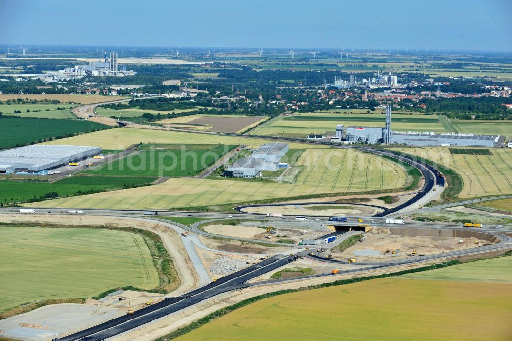 Aerial photograph Bernburg - Baustelle vom Neubau der Ortsumgehung Bernburg Bundesstraße B 6n mit Anschlußstelle an die Autobahn / Bundesautobahn A 14 in Sachsen-Anhalt. Ein Projekt von EUROVIA. Construction site of the new circuitous road B6n Bernburg with the new junction on to the freeway in the near of Bernburg in Saxony-Anhalt.