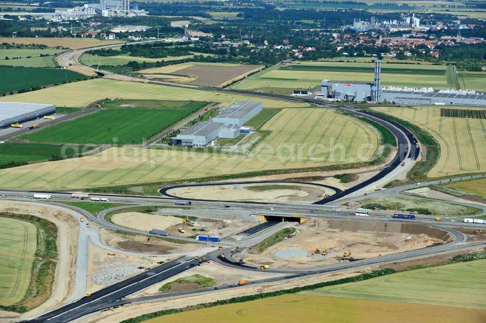 Bernburg from above - Baustelle vom Neubau der Ortsumgehung Bernburg Bundesstraße B 6n mit Anschlußstelle an die Autobahn / Bundesautobahn A 14 in Sachsen-Anhalt. Ein Projekt von EUROVIA. Construction site of the new circuitous road B6n Bernburg with the new junction on to the freeway in the near of Bernburg in Saxony-Anhalt.