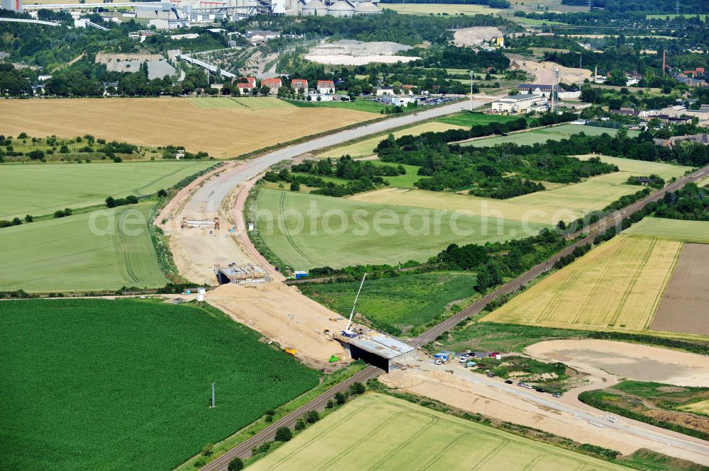 Aerial photograph Bernburg - Baustelle vom Neubau der Ortsumgehung Bernburg Bundesstraße B 6n mit Anschlußstelle an die Autobahn / Bundesautobahn A 14 in Sachsen-Anhalt. Ein Projekt von EUROVIA. Construction site of the new circuitous road B6n Bernburg with the new junction on to the freeway in the near of Bernburg in Saxony-Anhalt.