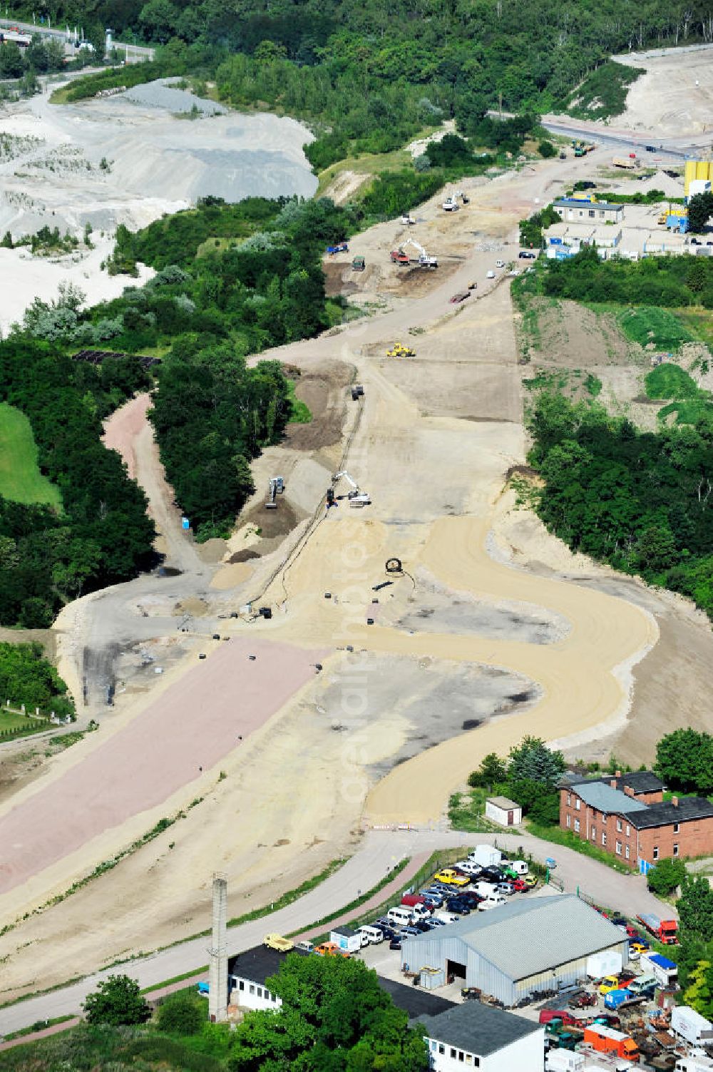 Bernburg from above - Baustelle vom Neubau der Ortsumgehung Bernburg Bundesstraße B 6n mit Anschlußstelle an die Autobahn / Bundesautobahn A 14 in Sachsen-Anhalt. Ein Projekt von EUROVIA. Construction site of the new circuitous road B6n Bernburg with the new junction on to the freeway in the near of Bernburg in Saxony-Anhalt.