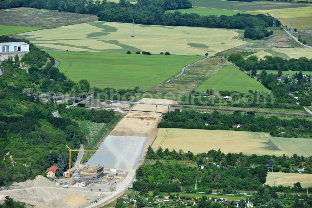 Aerial photograph Bernburg - Baustelle vom Neubau der Ortsumgehung Bernburg Bundesstraße B 6n mit Anschlußstelle an die Autobahn / Bundesautobahn A 14 in Sachsen-Anhalt. Ein Projekt von EUROVIA. Construction site of the new circuitous road B6n Bernburg with the new junction on to the freeway in the near of Bernburg in Saxony-Anhalt.