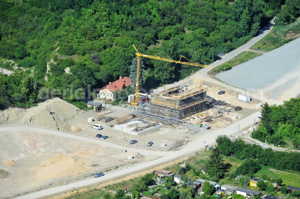 Aerial image Bernburg - Baustelle vom Neubau der Ortsumgehung Bernburg Bundesstraße B 6n mit Anschlußstelle an die Autobahn / Bundesautobahn A 14 in Sachsen-Anhalt. Ein Projekt von EUROVIA. Construction site of the new circuitous road B6n Bernburg with the new junction on to the freeway in the near of Bernburg in Saxony-Anhalt.