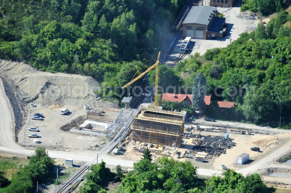 Aerial photograph Bernburg - Baustelle vom Neubau der Ortsumgehung Bernburg Bundesstraße B 6n mit Anschlußstelle an die Autobahn / Bundesautobahn A 14 in Sachsen-Anhalt. Ein Projekt von EUROVIA. Construction site of the new circuitous road B6n Bernburg with the new junction on to the freeway in the near of Bernburg in Saxony-Anhalt.