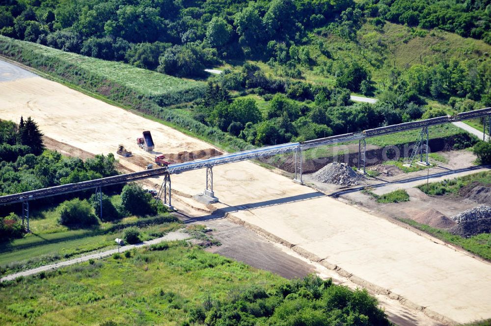 Bernburg from above - Baustelle vom Neubau der Ortsumgehung Bernburg Bundesstraße B 6n mit Anschlußstelle an die Autobahn / Bundesautobahn A 14 in Sachsen-Anhalt. Ein Projekt von EUROVIA. Construction site of the new circuitous road B6n Bernburg with the new junction on to the freeway in the near of Bernburg in Saxony-Anhalt.