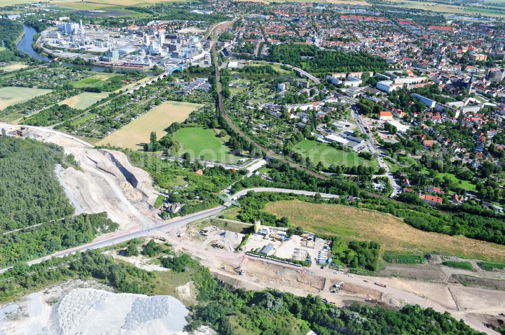 Aerial photograph Bernburg - Baustelle vom Neubau der Ortsumgehung Bernburg Bundesstraße B 6n mit Anschlußstelle an die Autobahn / Bundesautobahn A 14 in Sachsen-Anhalt. Ein Projekt von EUROVIA. Construction site of the new circuitous road B6n Bernburg with the new junction on to the freeway in the near of Bernburg in Saxony-Anhalt.