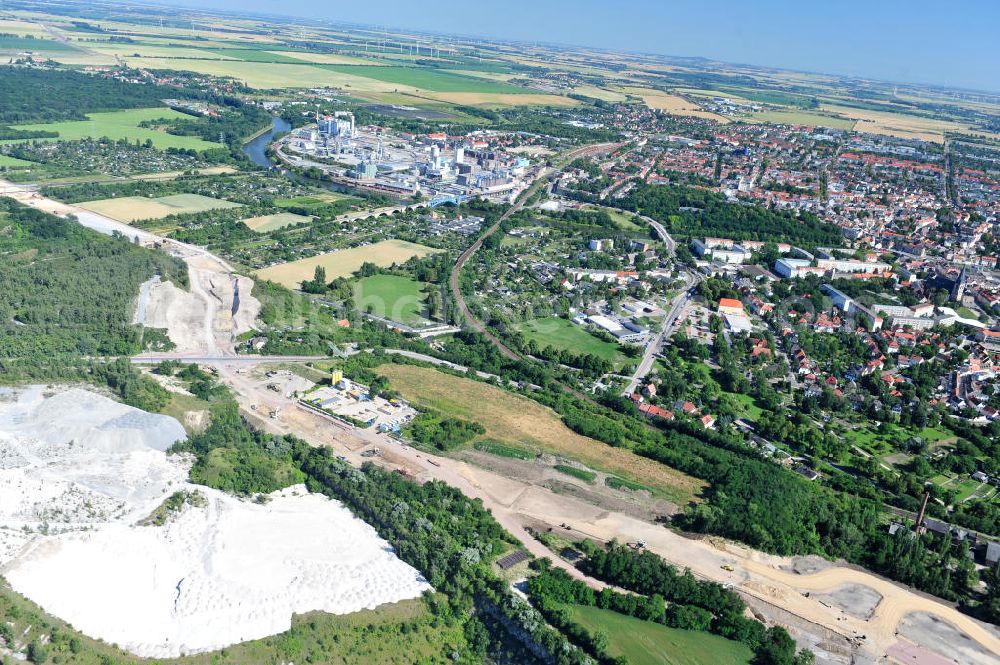 Bernburg from above - Baustelle vom Neubau der Ortsumgehung Bernburg Bundesstraße B 6n mit Anschlußstelle an die Autobahn / Bundesautobahn A 14 in Sachsen-Anhalt. Ein Projekt von EUROVIA. Construction site of the new circuitous road B6n Bernburg with the new junction on to the freeway in the near of Bernburg in Saxony-Anhalt.