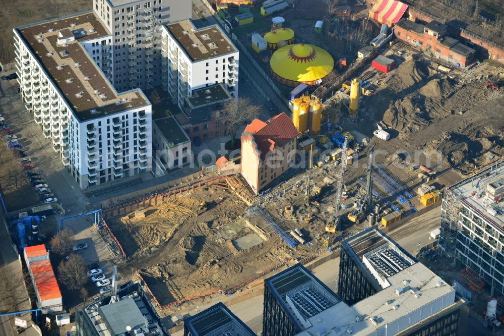 Berlin from the bird's eye view: Construction site on the Postbahnhof in the Marianne von Rantzau-Strasse next to the Mercedes-Benz sales in Berlin-Germany