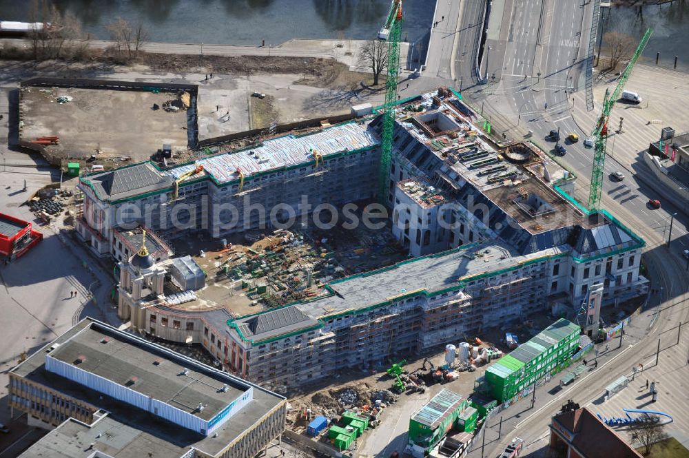 Aerial photograph Potsdam - Construction site of the Potsdam Stadtschloss at the Old Market. In the background is the University of Applied Sciences Potsdam and St. Nikolai Church. Building contractors company: BAM Deutschland AG