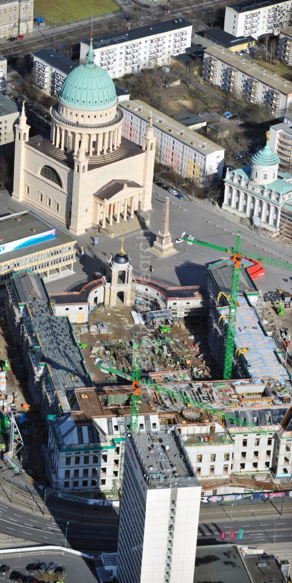 Aerial image Potsdam - Construction site of the Potsdam Stadtschloss at the Old Market. In the background is the University of Applied Sciences Potsdam and St. Nikolai Church. Building contractors company: BAM Deutschland AG