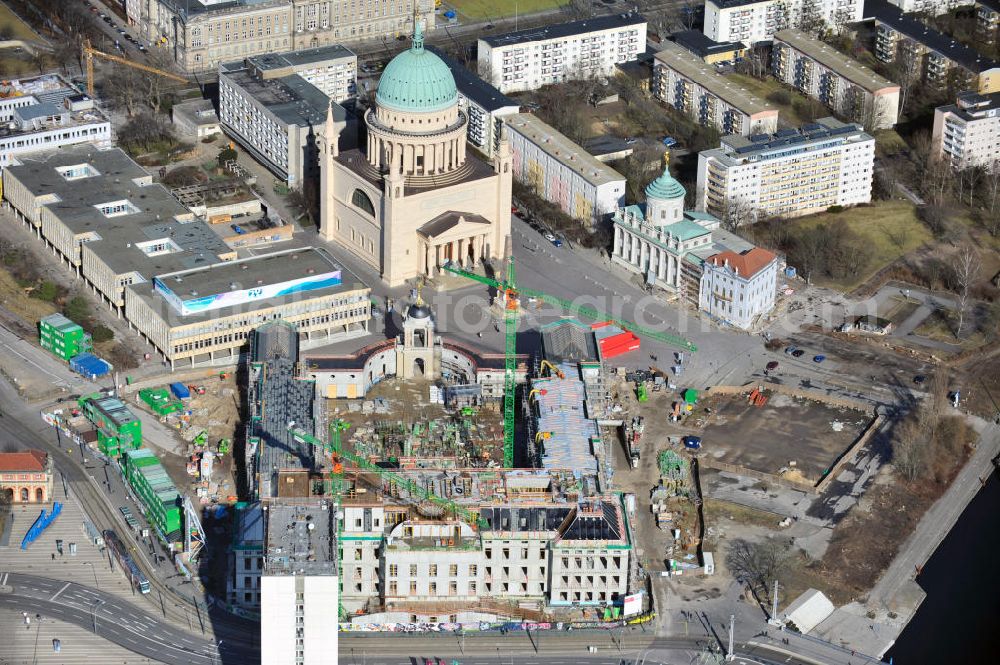 Aerial photograph Potsdam - Construction site of the Potsdam Stadtschloss at the Old Market. In the background is the University of Applied Sciences Potsdam and St. Nikolai Church. Building contractors company: BAM Deutschland AG