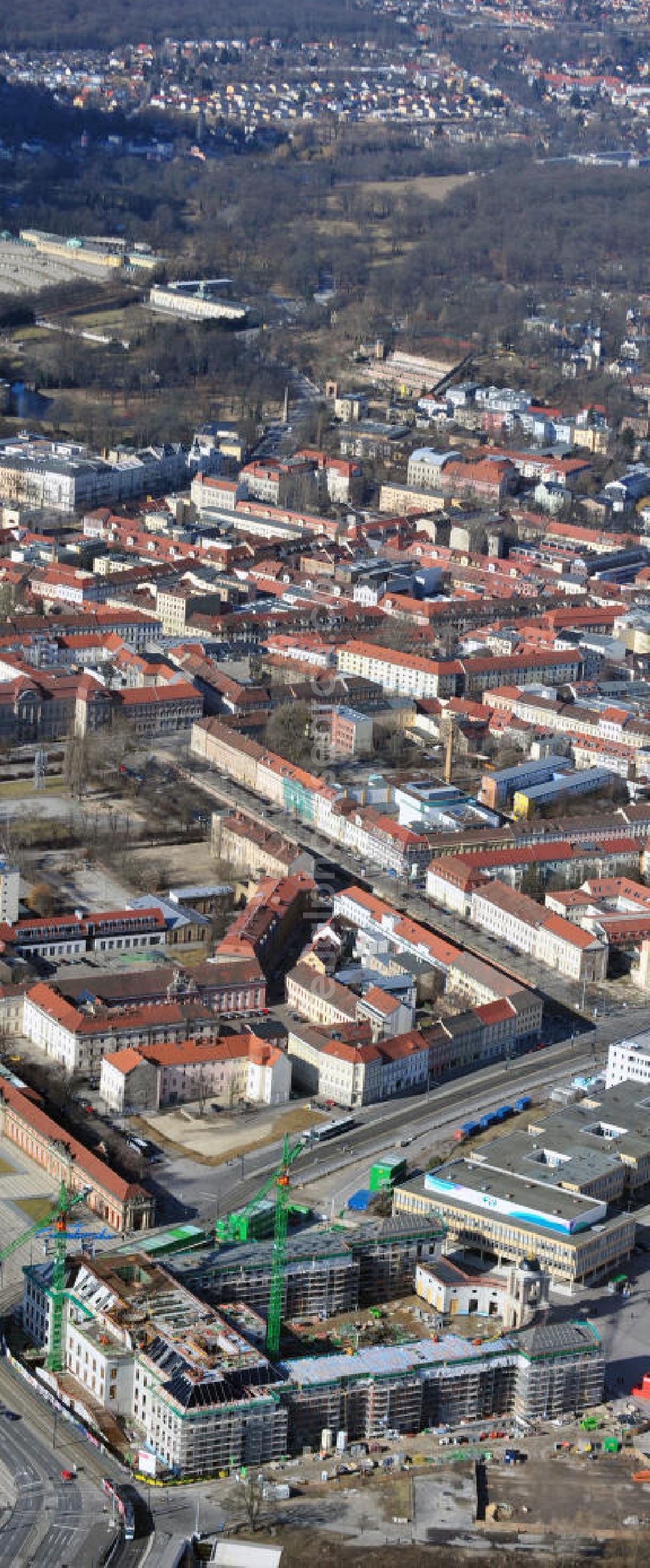 Aerial photograph Potsdam - Construction site of the Potsdam Stadtschloss at the Old Market. In the background is the University of Applied Sciences Potsdam and St. Nikolai Church. Building contractors company: BAM Deutschland AG