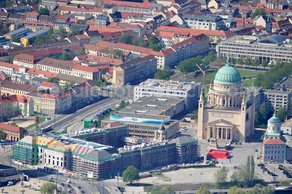 Aerial image Potsdam - Construction site of the Potsdam Stadtschloss at the Old Market. In the background is the University of Applied Sciences Potsdam and St. Nikolai Church. Building contractors company: BAM Deutschland AG