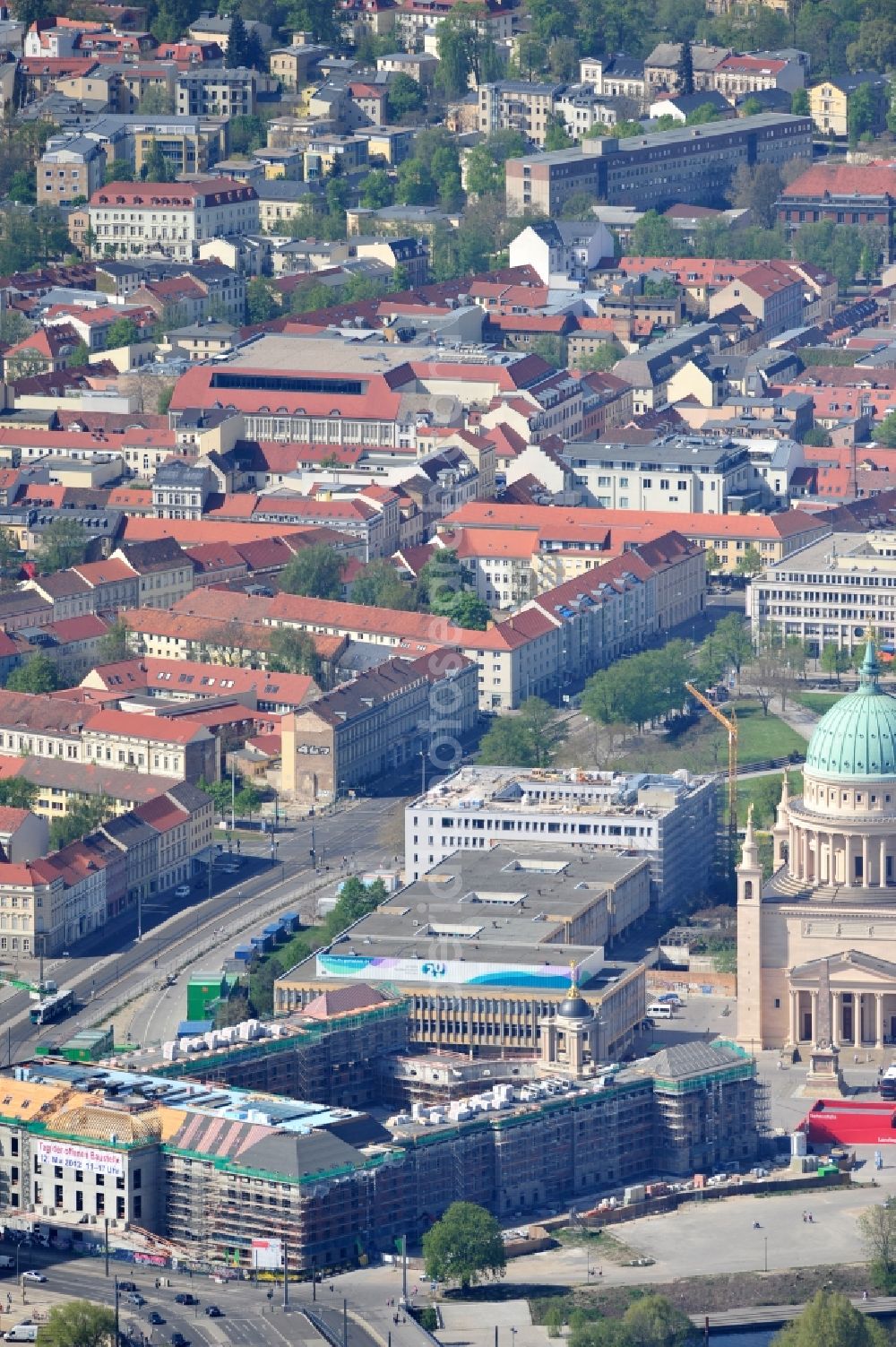 Aerial photograph Potsdam - Construction site of the Potsdam Stadtschloss at the Old Market. In the background is the University of Applied Sciences Potsdam and St. Nikolai Church. Building contractors company: BAM Deutschland AG