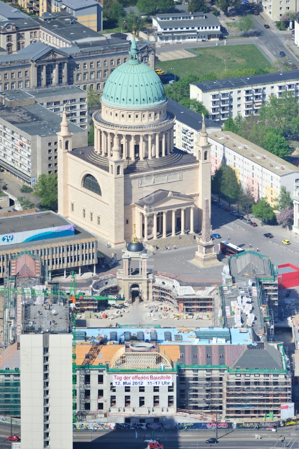 Aerial photograph Potsdam - Construction site of the Potsdam Stadtschloss at the Old Market. In the background is the University of Applied Sciences Potsdam and St. Nikolai Church. Building contractors company: BAM Deutschland AG