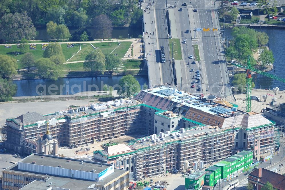 Aerial image Potsdam - Construction site of the Potsdam Stadtschloss at the Old Market. In the background is the University of Applied Sciences Potsdam and St. Nikolai Church. Building contractors company: BAM Deutschland AG