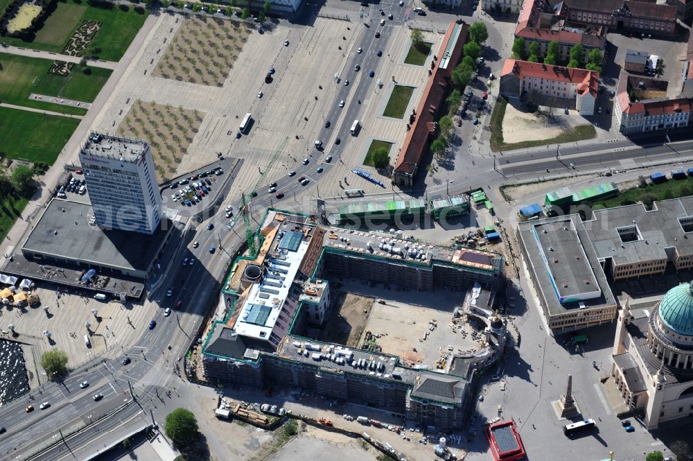 Aerial photograph Potsdam - Construction site of the Potsdam Stadtschloss at the Old Market. In the background is the University of Applied Sciences Potsdam and St. Nikolai Church. Building contractors company: BAM Deutschland AG