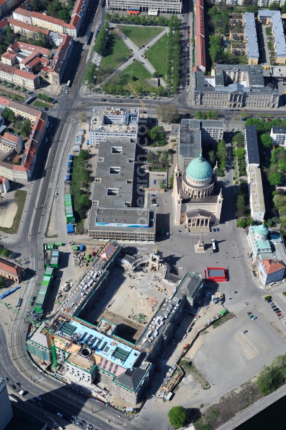 Aerial photograph Potsdam - Construction site of the Potsdam Stadtschloss at the Old Market. In the background is the University of Applied Sciences Potsdam and St. Nikolai Church. Building contractors company: BAM Deutschland AG