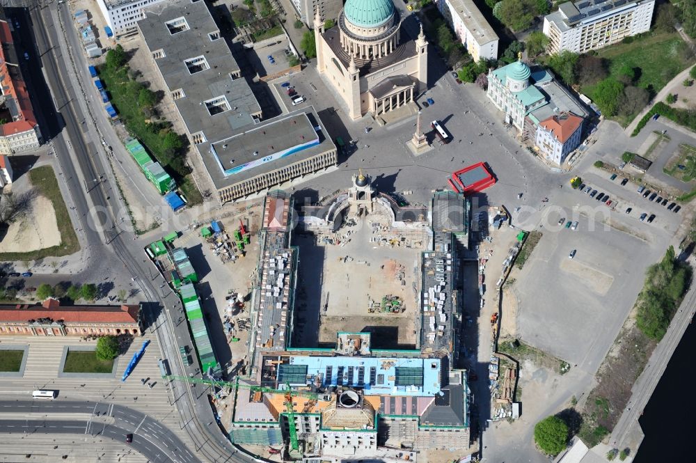 Potsdam from above - Construction site of the Potsdam Stadtschloss at the Old Market. In the background is the University of Applied Sciences Potsdam and St. Nikolai Church. Building contractors company: BAM Deutschland AG