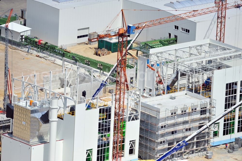 Torgau from above - Construction site of a new build production facility for wood pellets in Torgau in the state Saxony