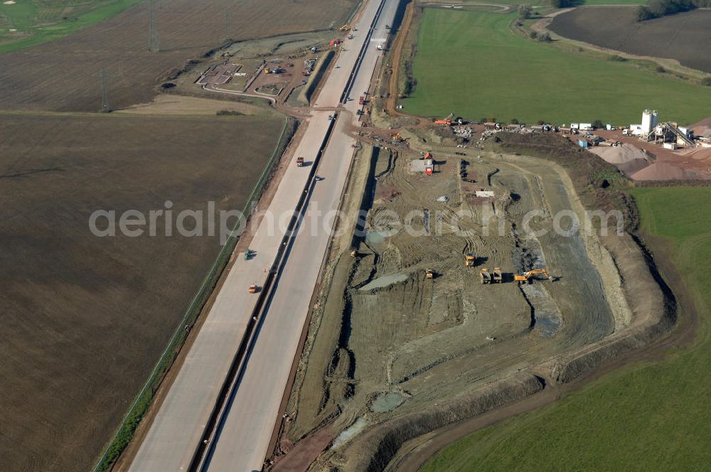 Aerial image Wenigenlupnitz - Blick auf die Baustelle der südlichen (h) und nördlichen (v) PWC-Anlage / Parkplatz mit WC / Rastplatz der A4 bei Wenigenlupnitz. Der Neubau ist Teil des Projekt Nordverlegung / Umfahrung Hörselberge der Autobahn E40 / A4 in Thüringen bei Eisenach. Durchgeführt werden die im Zuge dieses Projektes notwendigen Arbeiten unter an derem von den Mitarbeitern der Niederlassung Weimar der EUROVIA Verkehrsbau Union sowie der Niederlassungen Abbruch und Erdbau, Betonstraßenbau, Ingenieurbau und TECO Schallschutz der EUROVIA Beton sowie der DEGES.